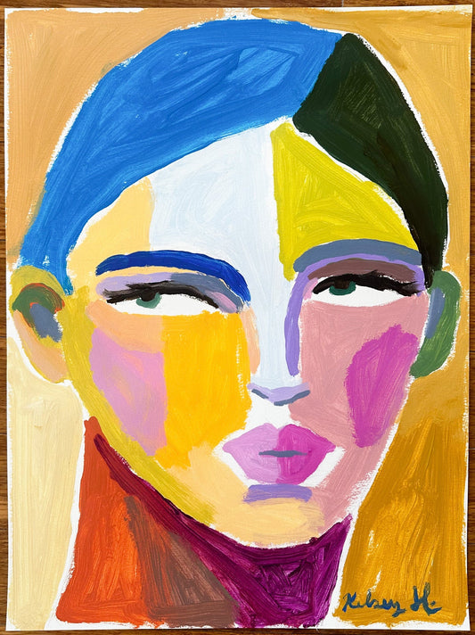 Colorful abstract painting of a face on a wooden surface