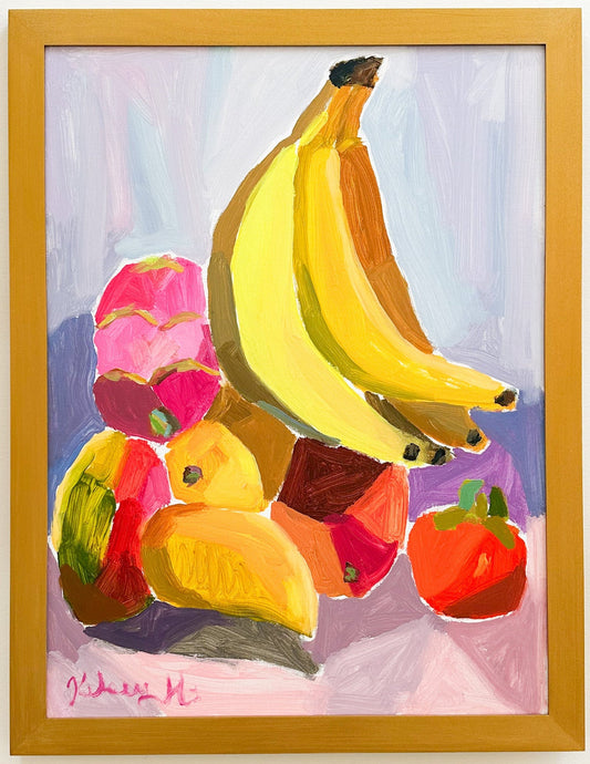 Framed painting of colorful fruit including bananas, mangos, pitaya, and a persimmon on a light purple background.