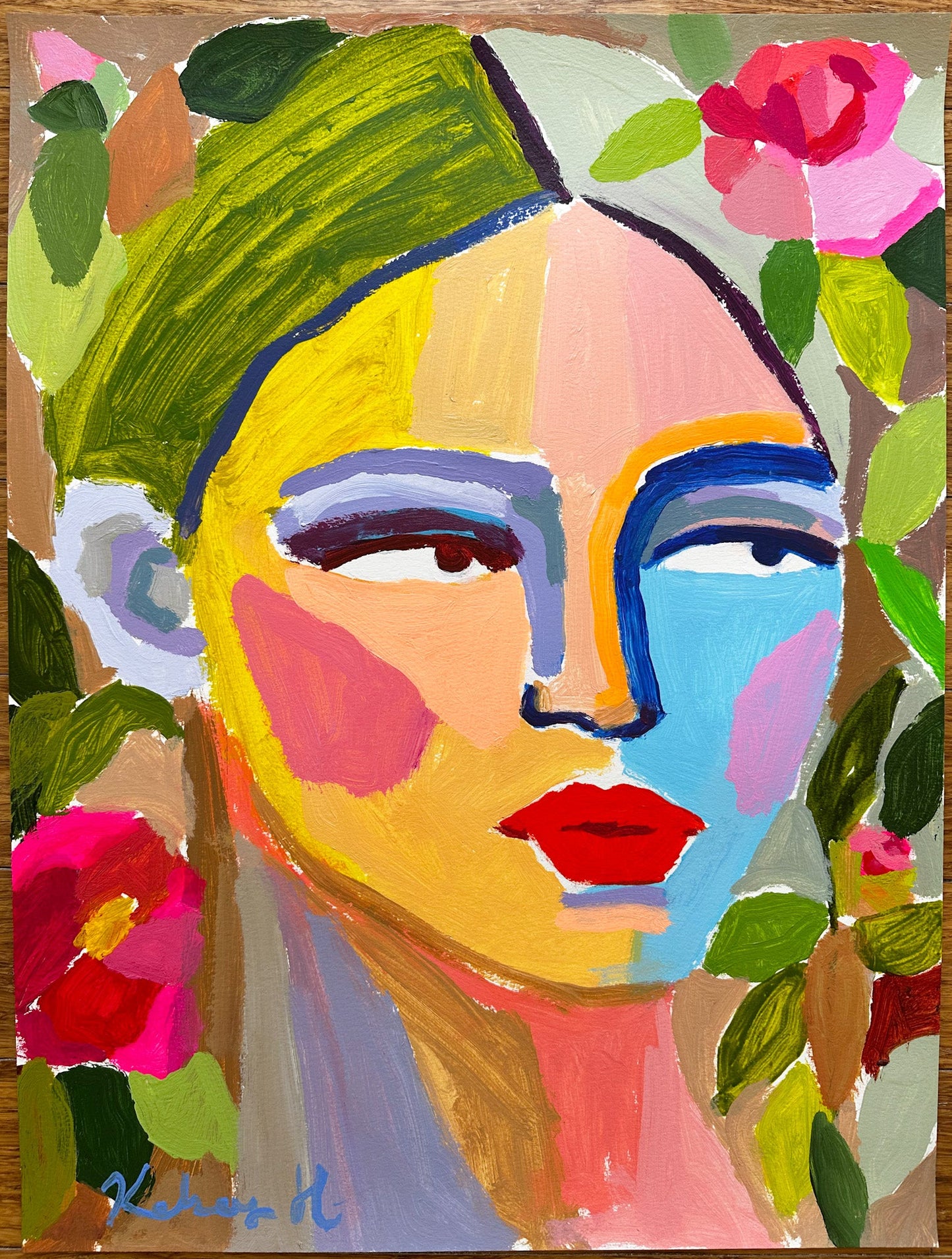 Colorful abstract painting of a face with flowers and leaves