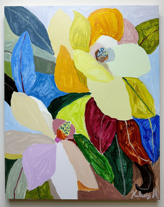 Colorful abstract painting of flowers on a white wall