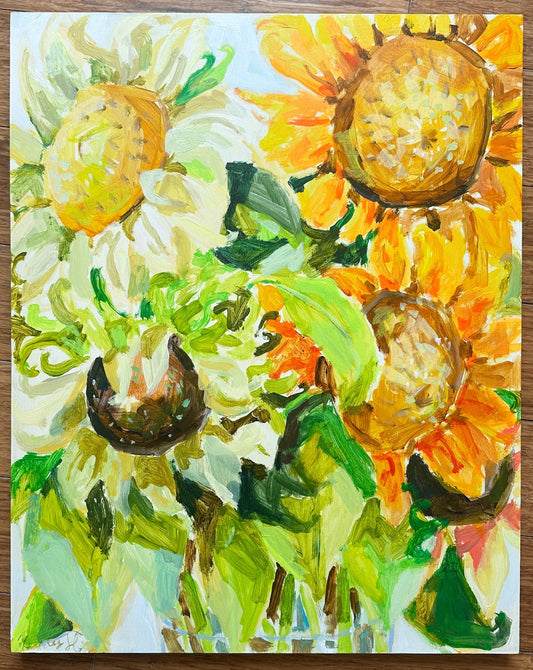 Painting of sunflowers on a wooden surface