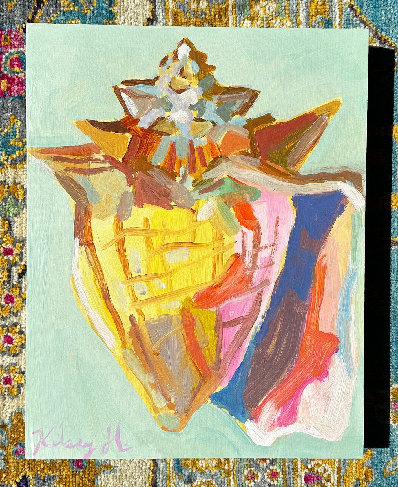 Abstract art piece on a textured fabric background