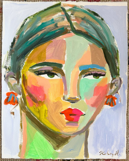 Abstract painting of a face with colorful strokes on a textured fabric background