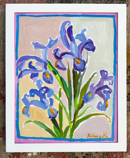 Painting of blue flowers with a colorful border on a textured fabric background